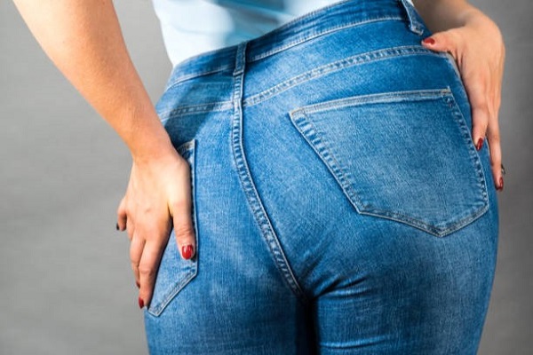 physically fit woman showing her butt