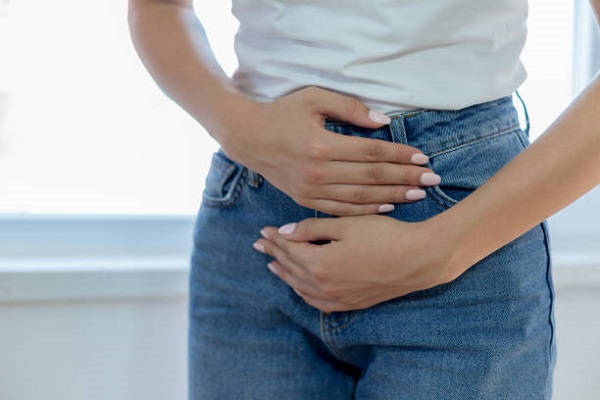 woman experiencing diarrhea after coolsculpting treatment