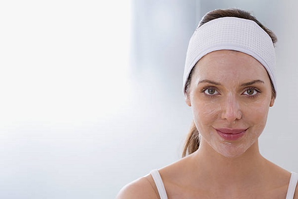 woman with salisylic acid solution applied to her face ready for chemical treatment