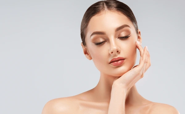 Beautiful woman showcasing smooth, glowing skin after Restylane Contour injection with proper aftercare and recovery process