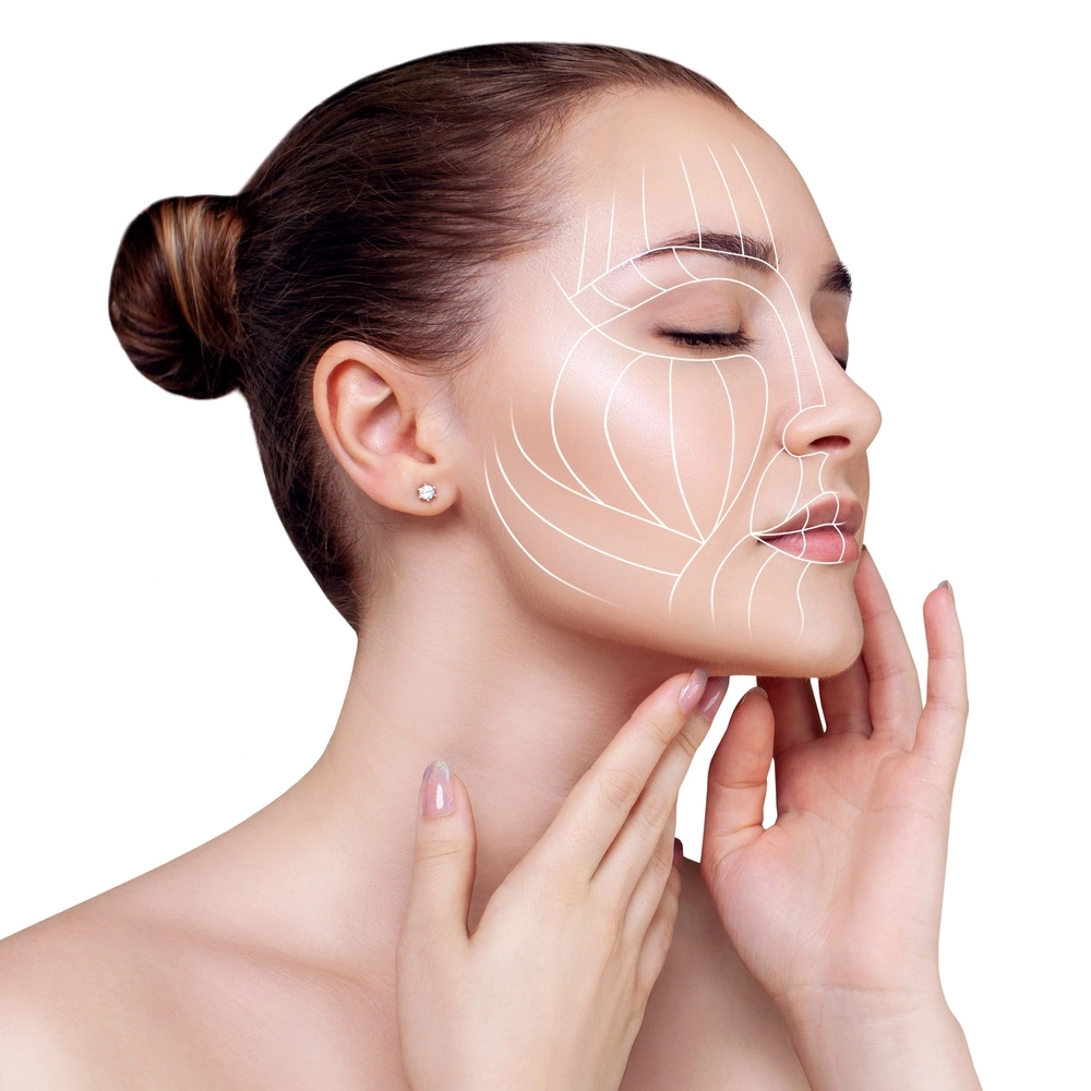 Woman touching her smooth skin with contour lines drawn, representing aftercare and recovery of Facetite procedure.
