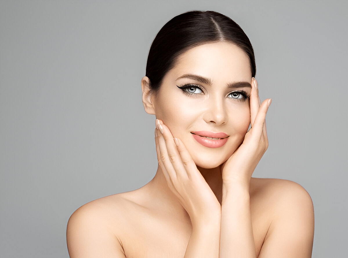 Woman showcasing smooth skin and natural glow after Juvederm Ultra Plus XC treatment with proper aftercare and recovery