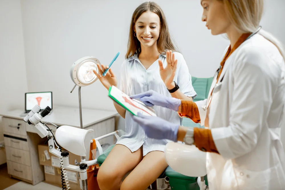 Doctor explaining the benefits of Morpheus8V treatment for vaginal rejuvenation to a patient, highlighting improved vaginal health and elasticity.