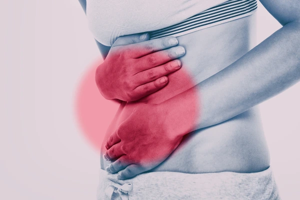 Illustration of abdominal discomfort, representing potential side effects and risks of Evolve fat reduction treatment
