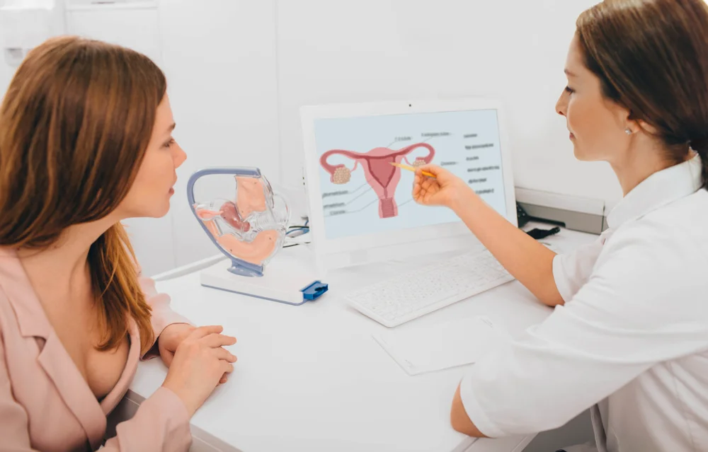 Doctor explaining FormaV benefits during a consultation for vaginal rejuvenation, highlighting improved vaginal tone, elasticity, and overall health.