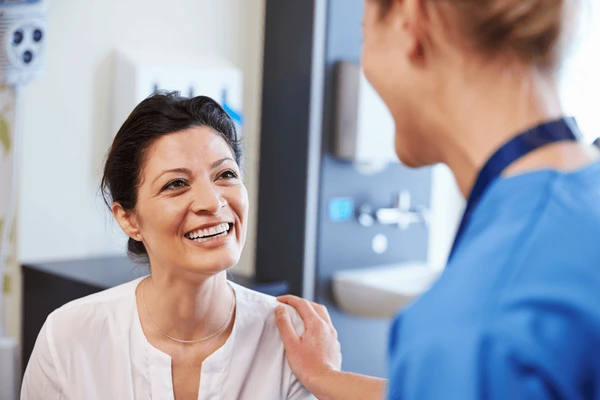 Female patient consulting with a practitioner before Juvederm Ultra XC treatment