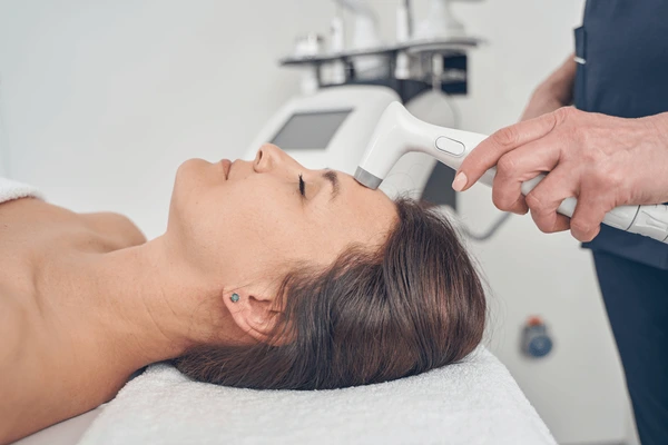 Benefits of TempSure Firm treatment for body contouring and skin tightening, showing advanced RF technology in action