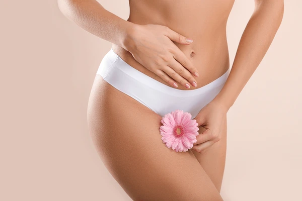 Woman showing results and recovery after a TempSure Vitalia vaginal rejuvenation treatment, symbolizing wellness and confidence.
