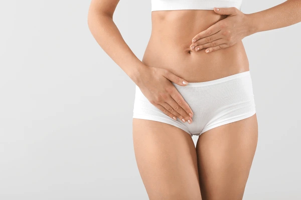 Woman showcasing the benefits of TempSure Vitalia treatment for non-invasive vaginal rejuvenation and improved wellness.